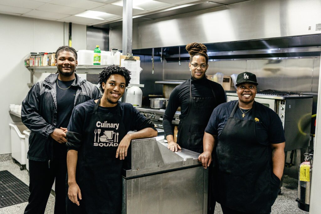 Culinary team preparing fresh meals at The Canopy